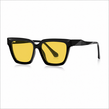 Óculos Vesper Day preto com lentes amarelas de filtro de luz azul, armação angular e design marcante sobre fundo branco.