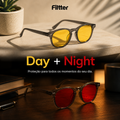 Imagem editorial do AURA Kit Day + Night, com óculos de armação Smoke e lentes amarelas em um ambiente iluminado durante o dia e óculos de armação Blue com lentes vermelhas em um ambiente noturno, acompanhados do texto “Day + Night — Proteção para todos os momentos do seu dia.”